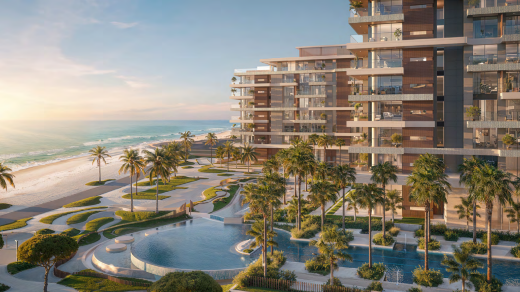 Bei Sonnenuntergang besteht der Apartmentkomplex am Meer in Ellington Cove aus großen Gebäuden mit Balkonen, einem großen Swimmingpool und wogenden Palmen. Der Sandstrand mit den Wellen des Ozeans bildet eine malerische Kulisse für diese moderne Oase.