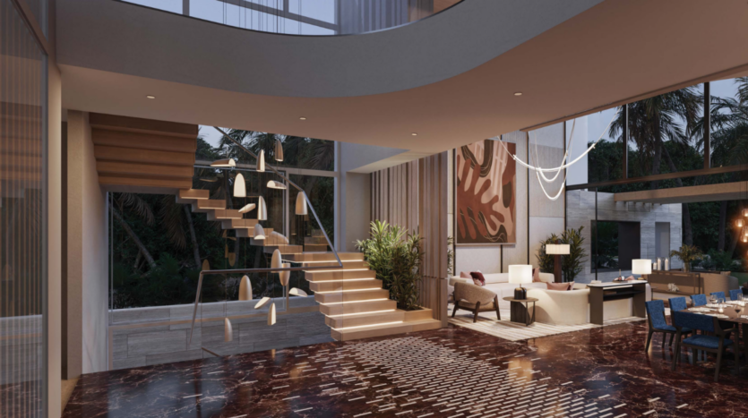 Salon moderne et luxueux signé Bo Monde avec un grand escalier. L'espace comprend un sol en marbre foncé, des luminaires contemporains et un grand tableau abstrait. Il y a un coin salon avec un canapé, des chaises et un lustre, entouré de fenêtres offrant une vue magnifique sur l'extérieur.