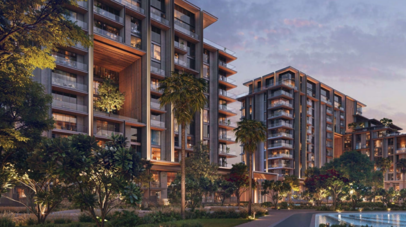 Moderne palazzine con ampie finestre e balconi adornano l'area di Crestlane, circondata da una vegetazione lussureggiante e da palme. Un sentiero si snoda attraverso giardini paesaggistici vicino a City Walk, con una piscina scintillante in primo piano sotto le morbide sfumature di un tramonto.
