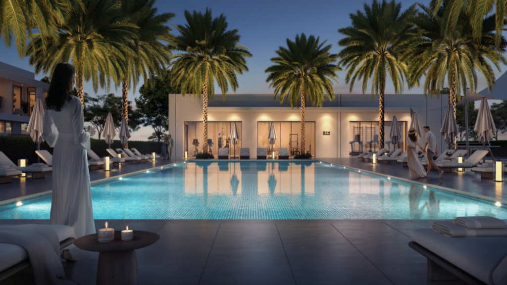 Una scena di piscina serena al tramonto, circondata da palme e illuminata da luci soffuse. Persone in accappatoio si rilassano sui lettini, mentre una donna di nome Elva si trova in riva al mare. L'edificio illuminato sullo sfondo aggiunge una calda atmosfera.