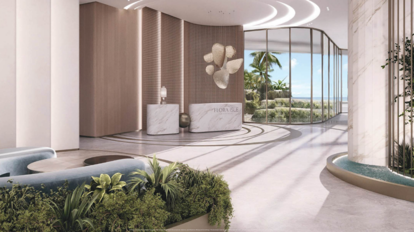 A modern, spacious lobby with curved architectural elements, featuring a marble reception counter, abstract wall art and large windows overlooking a garden with palm trees. Natural light floods the area, enhancing the elegant design.