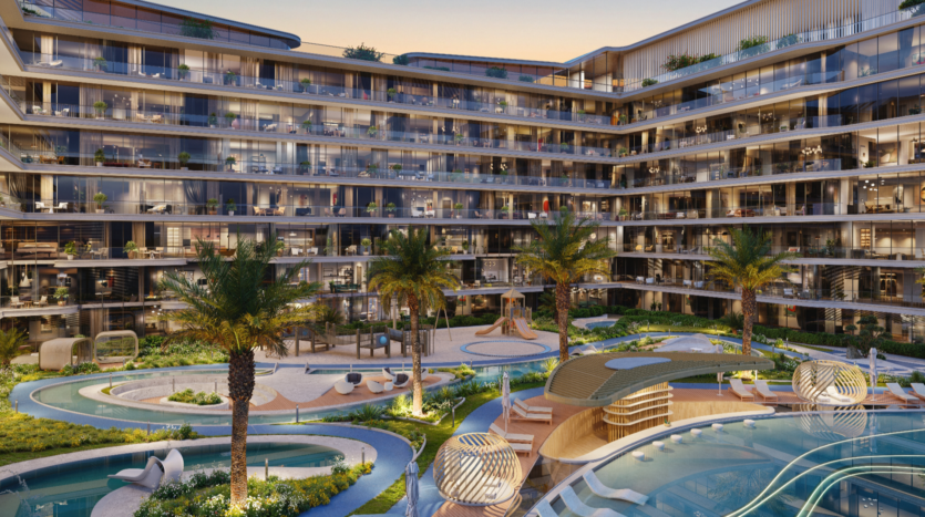 The Verano, a modern multi-story apartment complex, features large bay windows and balconies. Its landscaped courtyard features palm trees, winding paths, sitting areas and a pool for a relaxing outdoor space. Evening lighting adds a warm ambience to this elegant retreat.