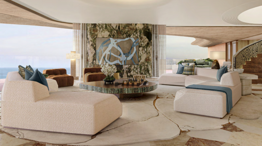 Luxurious living room with modern white sofas and blue accents, overlooking breathtaking views of Dubai's Asora Bay. A round coffee table centers the space, surrounded by abstract artwork and large windows offering ocean views. A spiral staircase on the right completes the elegant decor.