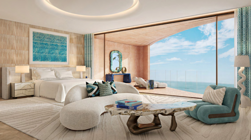 Luxurious room with king-size bed, modern furnishings and ocean-inspired decor reminiscent of Asora Bay. A bay window reveals a balcony with views similar to those of Dubai. Light colors and wood accents create an airy, tranquil atmosphere.