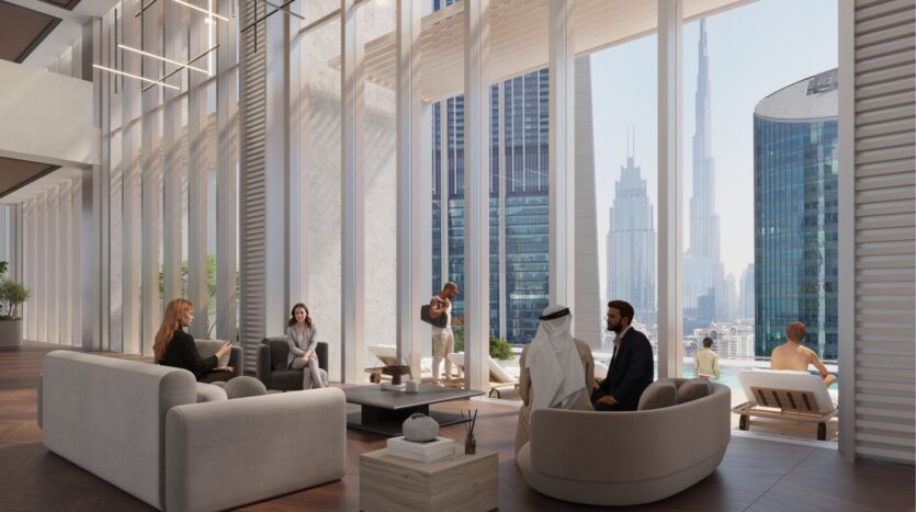 We sit and chat in a modern lounge with large windows overlooking the heights of the DIFC and its imposing skyscrapers. The room is elegantly furnished and the sunlight filters through slatted blinds, creating a serene atmosphere.