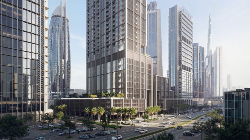View of a modern cityscape with towering skyscrapers and bustling streets. Cars drive along palm-lined roads, while the heights of the DIFC dominate the horizon with their glass and steel towers under an azure blue sky.