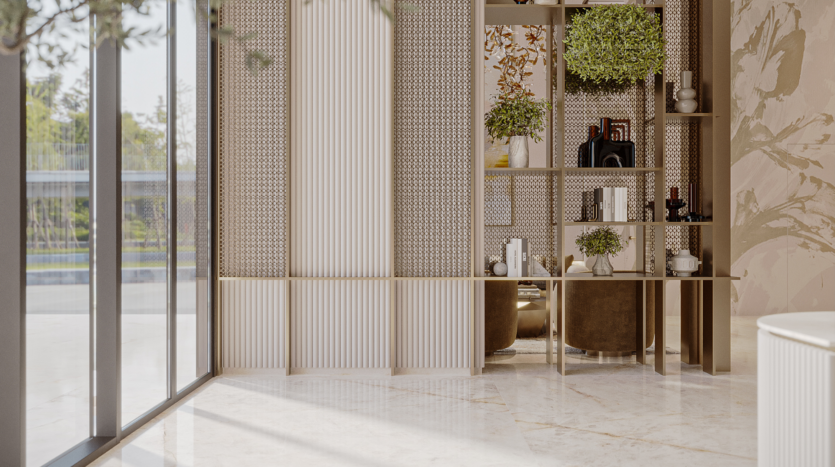 A bright, modern interior with large bay windows, marble flooring and decorative shelving adorned with plants, books, vases and delicate floral skies. A table and two upholstered chairs are partially visible behind the shelves.