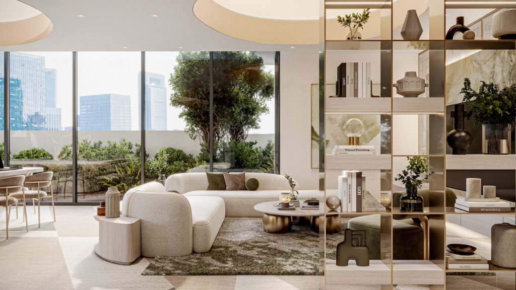 Un salon moderne à Arlington Park, Dubaï, dispose d'un canapé blanc incurvé, d'une table basse ronde, d'étagères décoratives, de grandes fenêtres avec vue sur la ville et d'un espace vert. Lumineux, spacieux, il est élégamment décoré de livres et de vases.