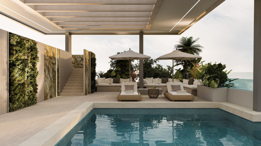 Terrasse extérieure moderne à Arlington Park Dubaï avec une piscine, deux chaises longues, des parasols, un coin salon, des plantes luxuriantes et un mur de jardin vertical, le tout sous une pergola partiellement couverte avec éclairage ambiant.