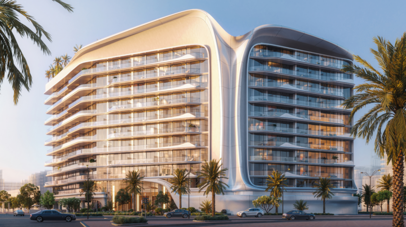 A modern, multi-storey apartment building with clean, curved architectural lines and large balconies, surrounded by palm trees and lit by the warmth of the sun, stands next to a street with parked cars.