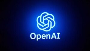 Le logo lumineux d'OpenAI apparaît au-dessus du mot « OpenAI » sur un fond sombre, tous deux éclairés par une lumière bleu vif, reflétant l'innovation observée dans OpenAI Abu Dhabi et Dubaï, où ChatGPT gratuit fait des vagues.