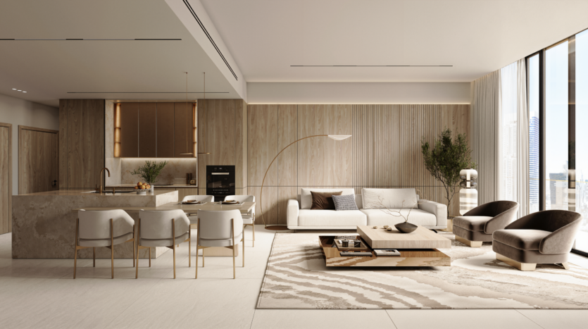 A modern, open-plan living/kitchen area, with light wood accents, a white sofa, two grey armchairs, a central marble island with four chairs, a coffee table, large windows and decorative plants. Natural light bathes the space.