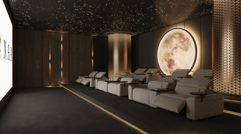 A luxurious home cinema with plush recliners, starry lights on the dark ceiling, a large illuminated moon mural and decorative lattice columns. A large screen is visible on the left.