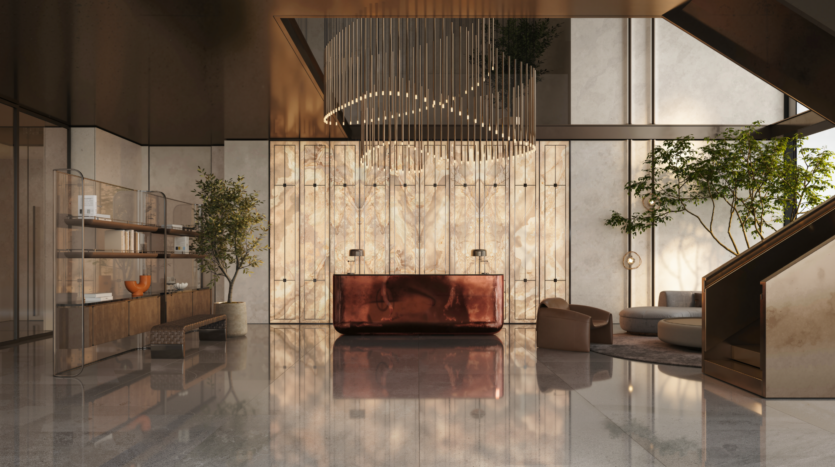 A modern hotel lobby with copper reception desk, high illuminated wall, sculptural chandelier, lounge seating, indoor trees and reflective marble floor. An ornate display case is to the left and a staircase to the right.