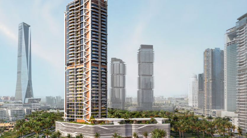 Altiera Heights by Ellington Properties is a modern high-rise residential building surrounded by palm trees, with several other large skyscrapers and towers visible in the background against a clear sky.