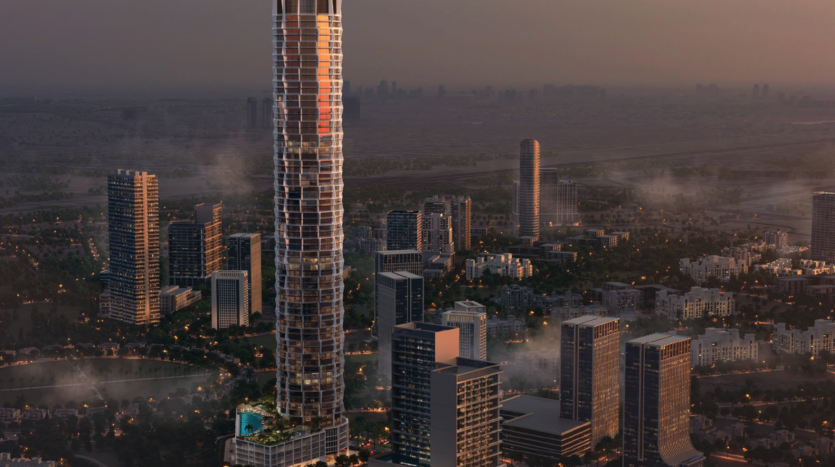 A large modern skyscraper dominates an urban landscape at dusk, surrounded by several smaller buildings and lush vegetation. Lights illuminate the buildings, and a misty sky creates a tranquil, atmospheric scene.