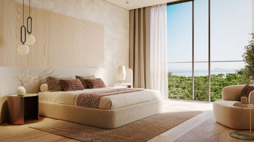 Moderna camera da letto del Talea by Beyond con letto king size, toni neutri, eleganti lampade a sospensione e finestre a tutta altezza con vista panoramica. I pavimenti in legno chiaro, l'arredamento minimal e la luce naturale del sole creano un'atmosfera serena ed elegante.