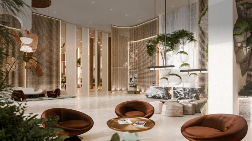 La moderna e lussuosa hall di Talea by Beyond è caratterizzata da sedie circolari marroni, tavoli in marmo, piante verdi, grandi pannelli decorativi, luci soffuse ed elementi artistici alle pareti, che creano un'atmosfera elegante e accogliente.