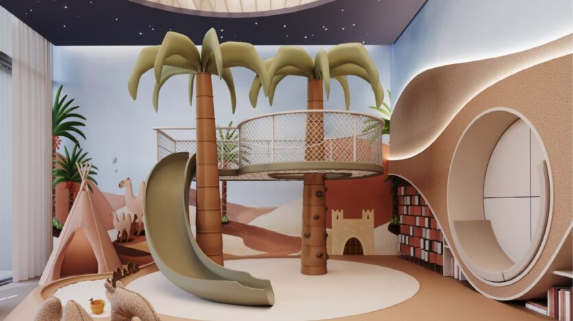 The children's playroom at Riverton House by Ellington Properties features palm tree structures with a circular slide, rope bridge, desert murals, teepee and curved shelves for a fun tropical adventure theme.
