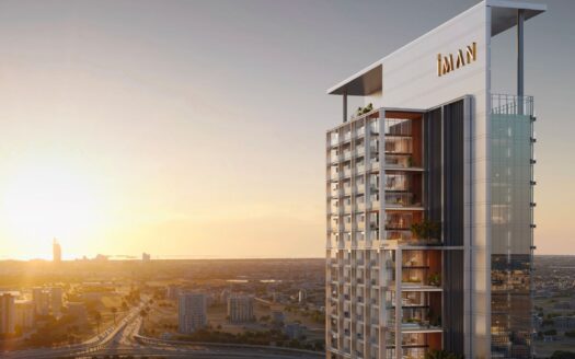 A modern tower with glass balconies and "IMAN" signs rises into the sunset, overlooking a sprawling cityscape - this is Sierra by IMAN, redefining luxury living on a breathtaking urban skyline.