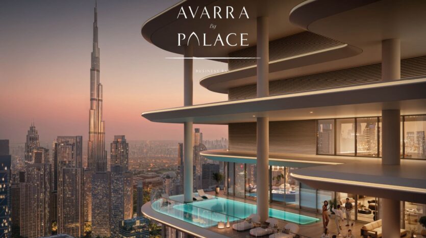 Avarra's modern luxury building features curved balconies and a rooftop pool, with views of the breathtaking Dubai skyline at sunset. The Burj Khalifa looms in the background as guests relax on the balcony and by the pool.
