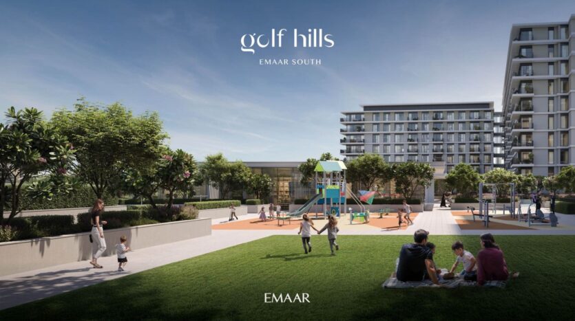 Un moderno complesso residenziale composto da edifici di medie dimensioni si affaccia su un prato verde e su un parco giochi dove i bambini si divertono. Famiglie che si godono una giornata di sole nel parco. "Golf Hills Emaar South" appare nella parte superiore della pagina, evidenziando la vita a Golf Hills.