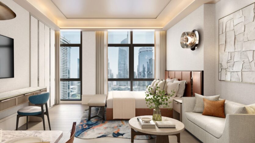 Modern room at Hilton Residences, equipped with king-size bed, sofa, desk and round table. Floor-to-ceiling windows reveal the city skyline. Neutral decor features light walls, wood accents and contemporary lighting for a relaxing stay.
