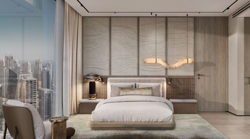 A modern room from Hilton Residences with a king-size bed, light bedding, textured wall panels, unique lamps, floor-to-ceiling curtains and a window offering a view of the city skyline with tall buildings.
