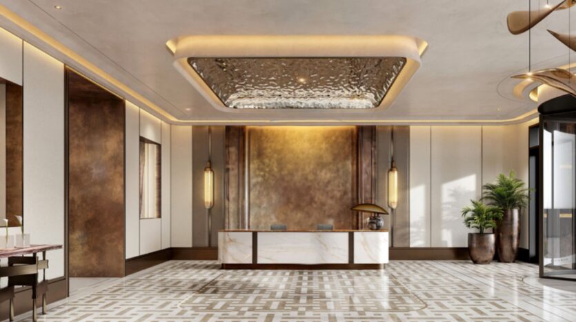 A modern Hilton Residences lobby with marble floors, geometric carpet, reception desk, tall brass wall panels, pendant lamps, large plants and soft recessed ceiling lighting.