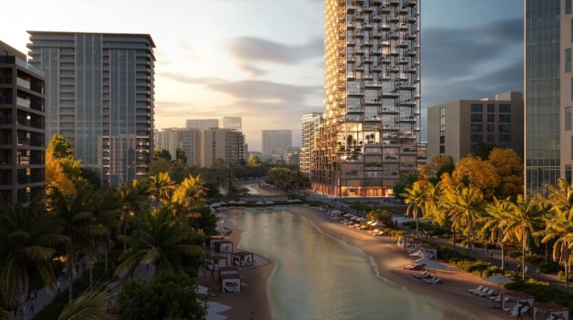 At sunset, the modern urban landscape consists of tall buildings, a central lagoon with sandy shores, and palm trees. It is a symphony of urban luxury and tropical relaxation, with lounge chairs for elegant relaxation.