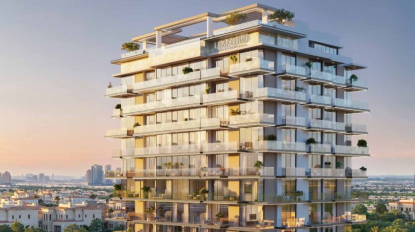 A modern multi-story residential building with glass balconies and rooftop terraces in Arlington Park 2, surrounded by urban landscapes and greenery, under a clear sky at sunset.