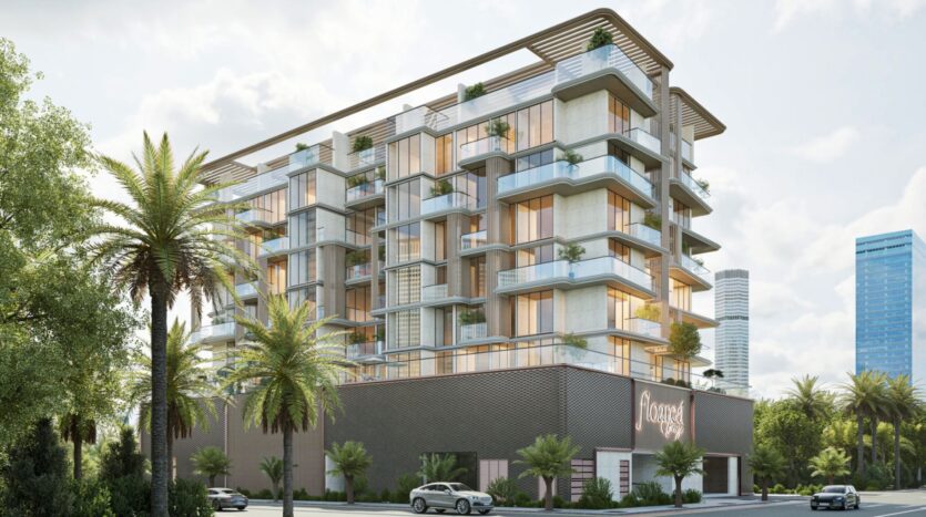 Floarea Breeze, un moderno condominio di medie dimensioni, presenta ampie vetrate e balconi circondati da palme. Davanti sono parcheggiate alcune auto, è esposto un cartello con la scritta "Rosegold" e sullo sfondo si ergono grandi edifici.