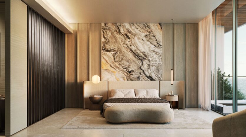 A modern bedroom by Lia with a large bed, an abstract marble artwork above the headboard, round bedside tables with lamps, floor-to-ceiling windows, light wood paneling, and neutral-colored decor.