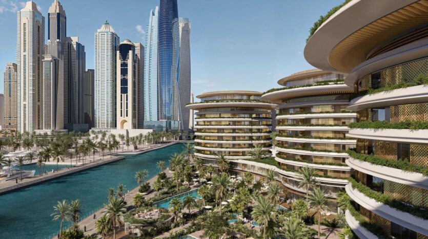 A modern cityscape featuring the tall skyscrapers of The Edition and uniquely designed round buildings along a canal, surrounded by lush greenery, palm trees, and swimming pools under a clear blue sky.