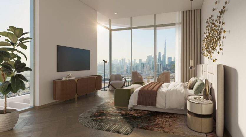 A modern bedroom with a large bed, elegant furnishings, and floor-to-ceiling windows offering panoramic views of the city. Warm sunlight fills the room, highlighting the elegant décor and tranquil art of a large plant next to the TV console.