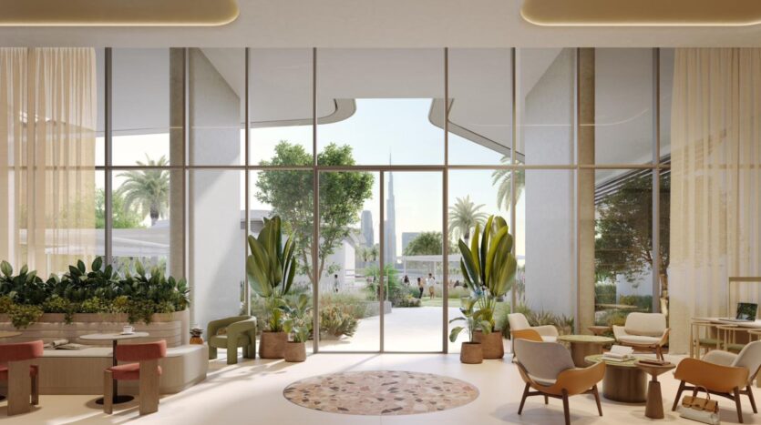 Modern living room with large bay windows overlooking a garden with palm trees. The room features comfortable seating, potted plants, and light curtains, blending art and comfort for a bright and welcoming atmosphere.