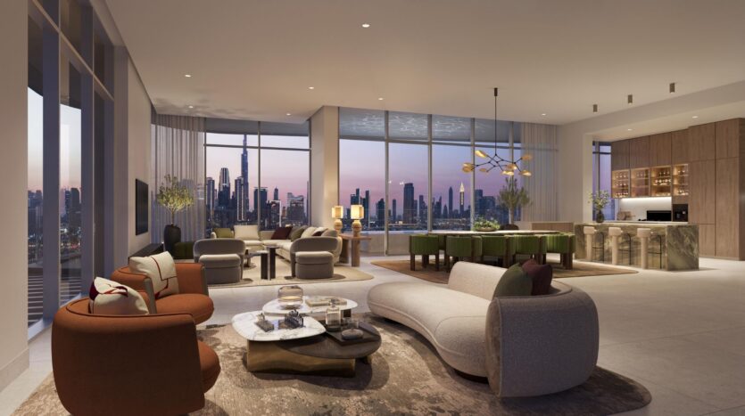 A spacious and modern living room and dining room, featuring elegant furnishings, large windows offering views of the city at sunset, and an open kitchen with wooden cabinets and a marble island, all designed with refined artistry.