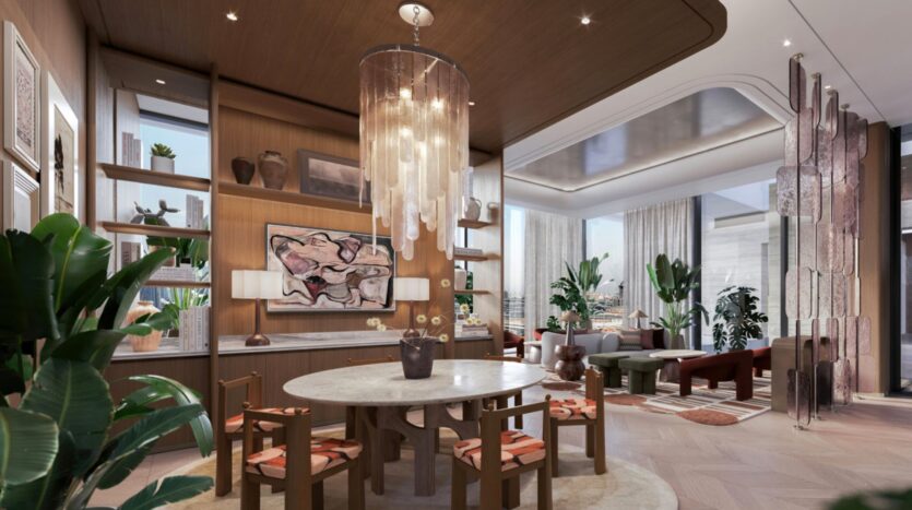 Contemporary dining room and living room at Eltiera Views with wood accents, a marble dining table, a modern chandelier, art and decorative objects, large windows, indoor plants, and abundant natural light.