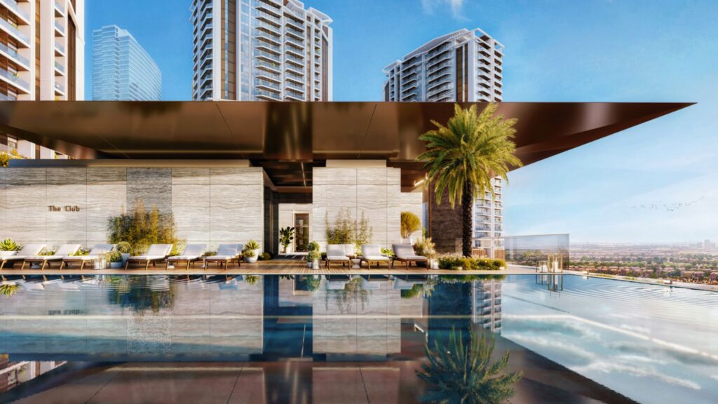 A modern rooftop pool with sun loungers, a palm tree, and city views, surrounded by tall skyscrapers under a clear blue sky, perfect for enjoying the breathtaking views of the Eltiera.