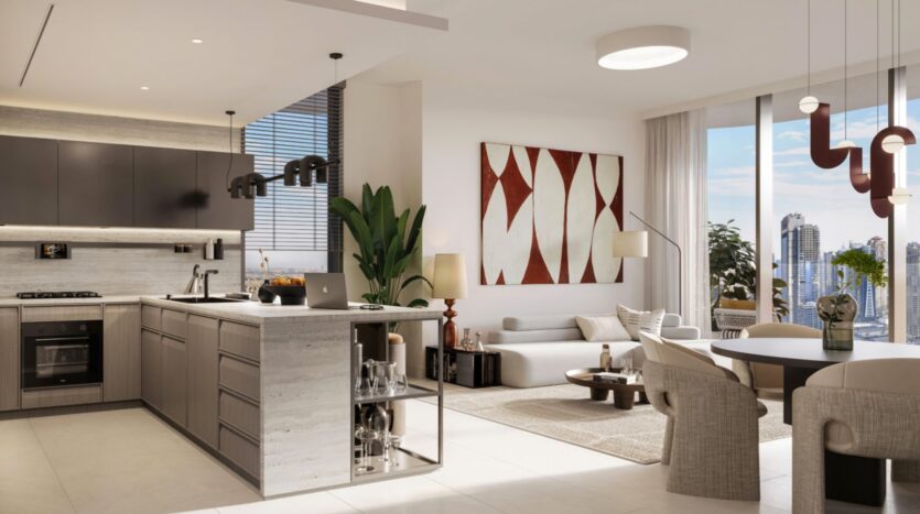 The kitchen and living room are modern and open-plan, featuring neutral tones, an island, a dining table, abstract wall art, large windows offering stunning views of the Eltiera, potted plants, and contemporary lighting fixtures.
