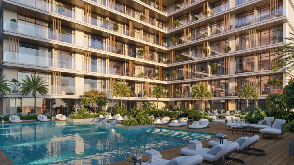 Linea, a modern luxury apartment complex, features large glass balconies overlooking a palm-fringed swimming pool, lush greenery, and stylish sun loungers on a wooden deck. The scene is calm and inviting in the warm sunlight.
