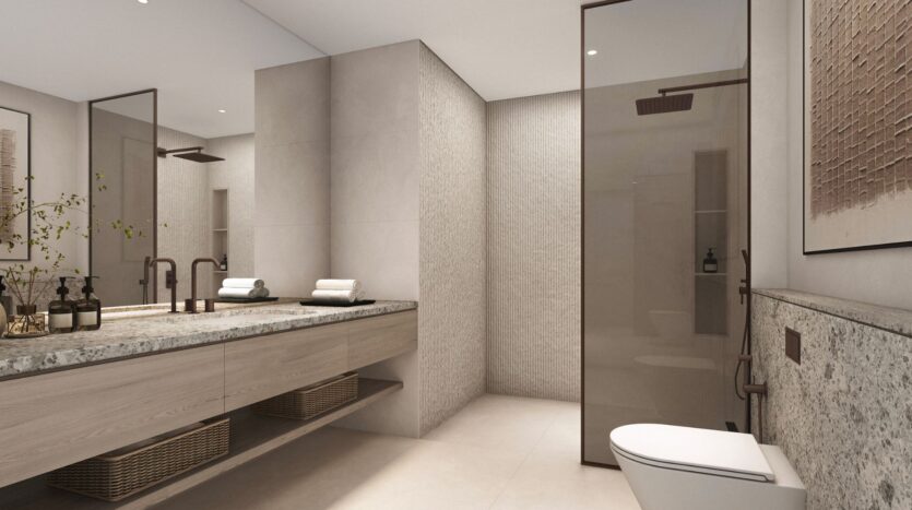 Modern Kanyon bathroom with double sink, large mirror, open wooden shelves with baskets, glass shower, wall-mounted toilet, neutral tones, and minimalist decor.