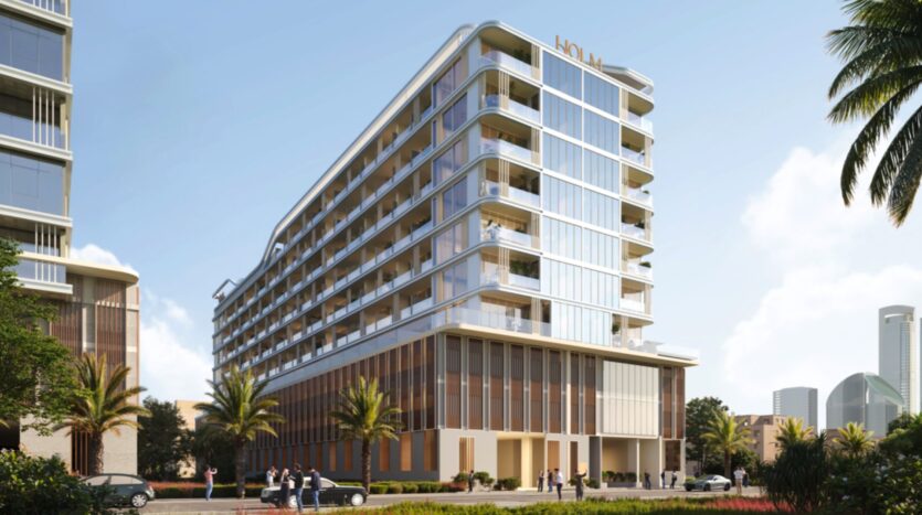 A modern, multi-story Linea building with large windows and balconies, surrounded by palm trees and greenery. People are walking nearby, the sky is clear, and tall buildings are visible in the background.