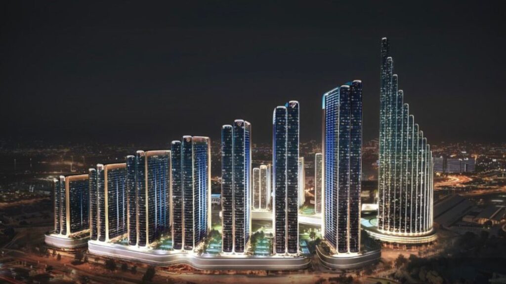 At night, the futuristic urban landscape of Mercedes Benz City is characterized by large, illuminated skyscrapers with unique shapes, resembling waves and terraces, all connected by a glowing base structure.