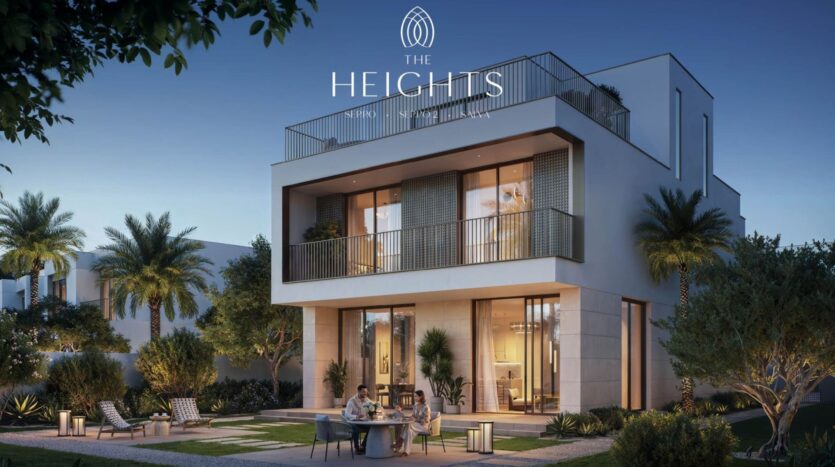 A modern two-story house with large windows and balconies, surrounded by palm trees and a landscaped garden. Three people are seated at a round table outside. The words "The Heights" are elegantly displayed at the top of the image.