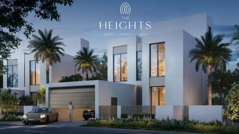 A modern white two-story villa with large windows and lush palm trees stands amid well-manicured greenery. Two cars are parked in front of the house, and a woman stands near the entrance. Above the house, the inscription "The Heights" is elegantly displayed.