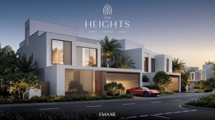 Modern white villas with large windows and palm trees line a quiet street at sunset. A red sports car is parked in front, emphasizing the exclusive appeal of The Heights by EMAAR. The text displays "The Heights" along with other details above the houses.
