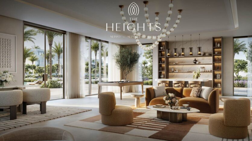 A modern and luxurious living room at The Heights features large windows, neutral-toned furniture, elegant lighting, and bookshelves. Palm trees and gardens are visible outside. The Heights logo and text are displayed at the top of the image.