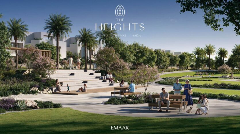 A landscaped park with palm trees, gardens, and people relaxing on benches and steps in The Heights. Modern buildings rise in the background. The text reads "The Heights, EMAAR, Expo 2 - SANAA."