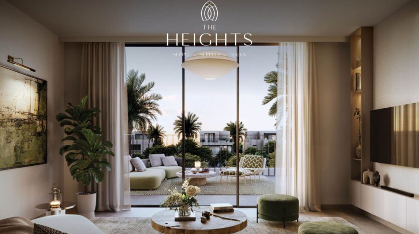Modern living room in The Heights with large glass doors opening onto a patio, outdoor seating, and palm trees. Neutral tones, plush furniture, and natural light create a relaxing and elegant atmosphere. Text logo "The Heights" at the top.